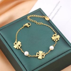 Pulseira de aço com pérola e trevo, ouro e prata